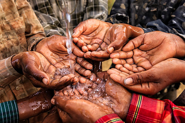 poor indian children keeping their hands up and asking for support.